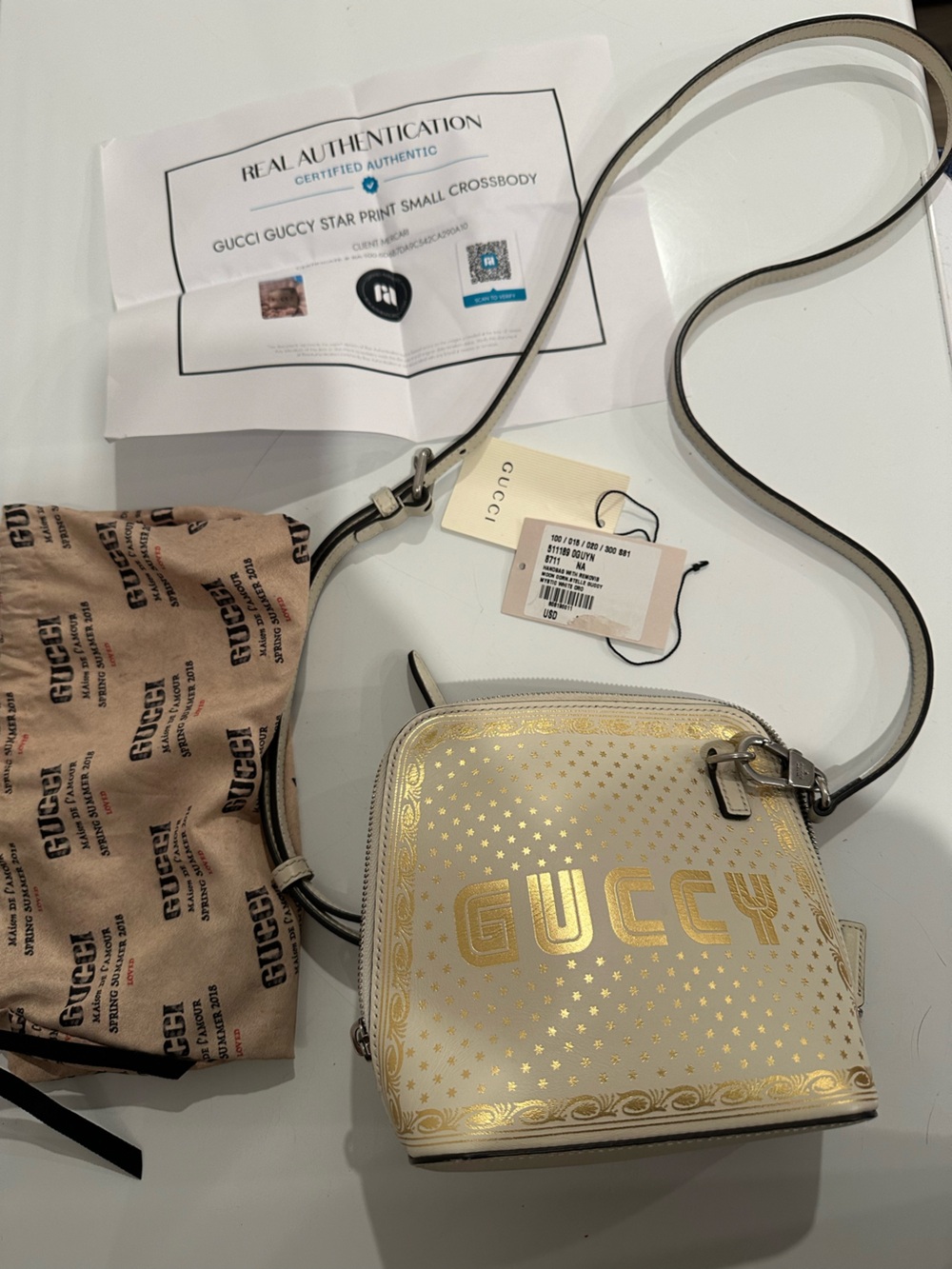 Gucci Cream and Gold 'GUCCY' Star Accent Crossbody Bag